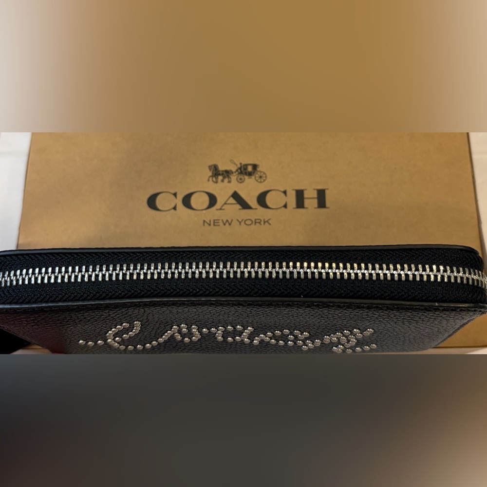 NWT COACH LIMITED EDITION STUDDED SCRIPT ZIPPER WALLET
7.5" (L) × 4" (H) - Picture 8 of 13